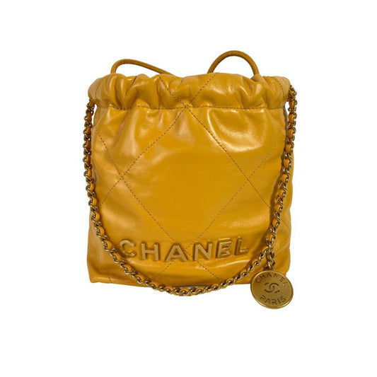 Chanel Gold Shiny Calfskin Quilted Mini 22